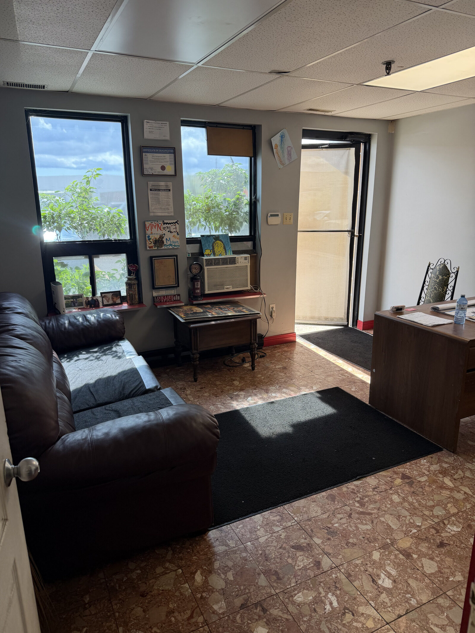Customer waiting lounge at Vamp Automotive, a car repair shop in North York